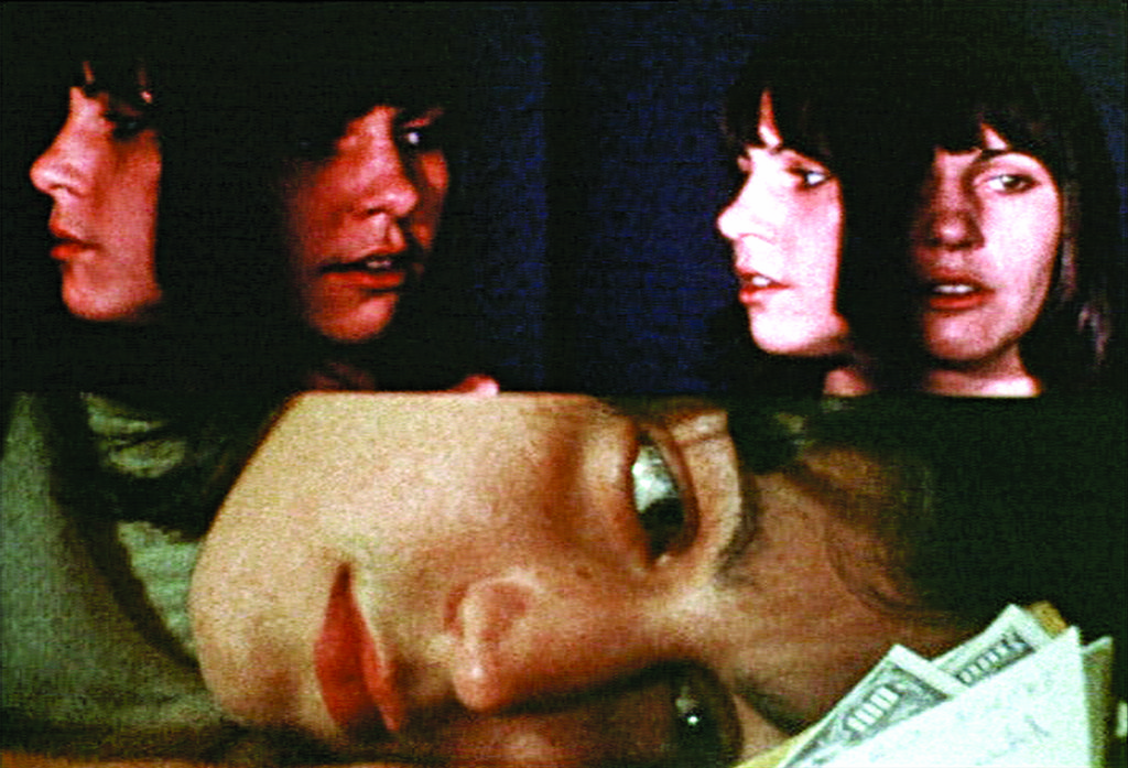 Still from a film by Leandro Katz, five faces in same frame